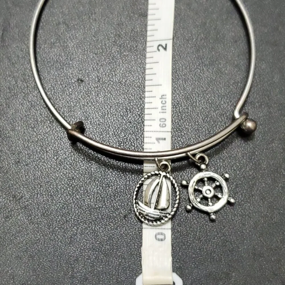 Silver tone sailing themed charm bangle bracelet 7.25